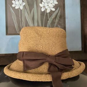 Fancet women’s straw sun hat with brown bow hat band, one size fits all.